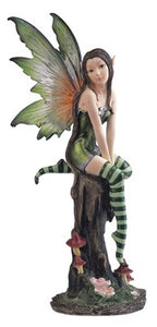 Fairy. Green. On Stump