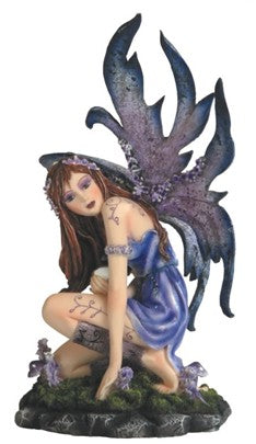 Fairy. Blue. Purple.  Kneeling
