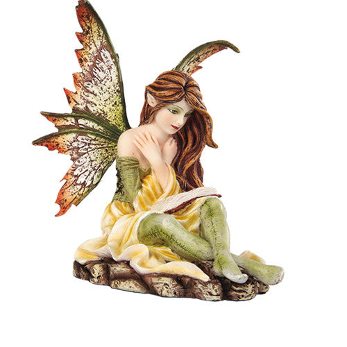 Fairy. Green w/yellow. Sitting