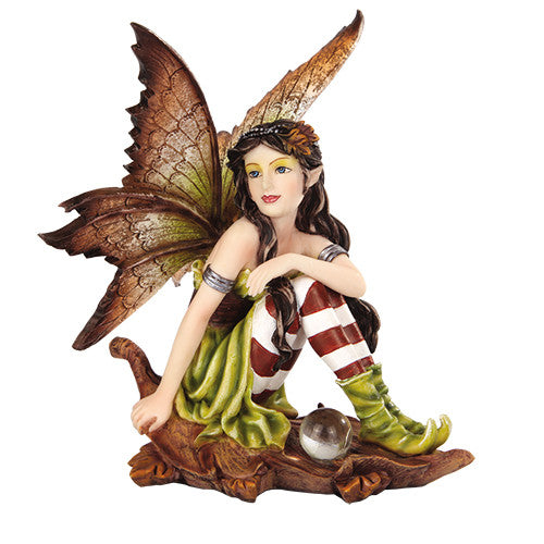 Fairy. Brown Green.  Sitting