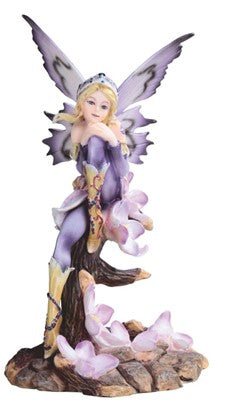 Fairy. Purple. Sitting on Branch