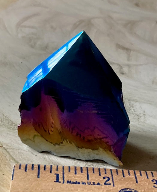 Point. Obsidian, titanium dipped. MED